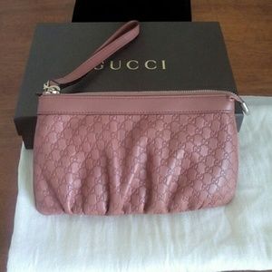 Genuine leather Gucci wrist wallet with strap